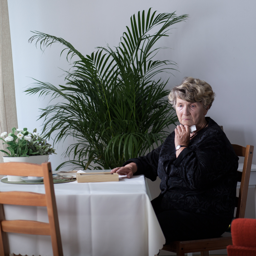 The Will Centre- What Happens When You Die Without A Will- A woman sat sadly dressed in all black